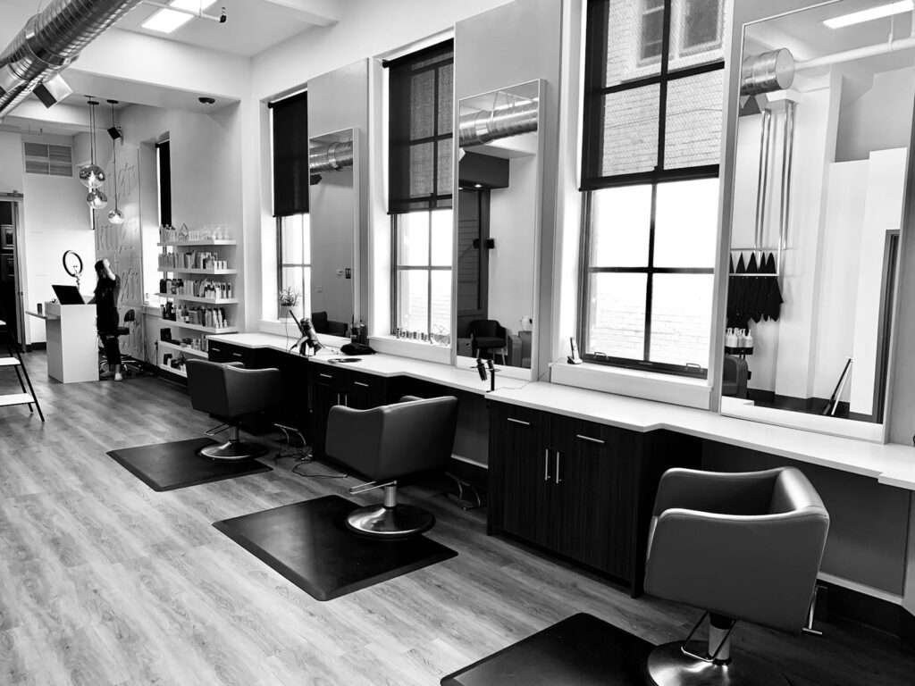 Stylist's chair and mirror in a modern salon