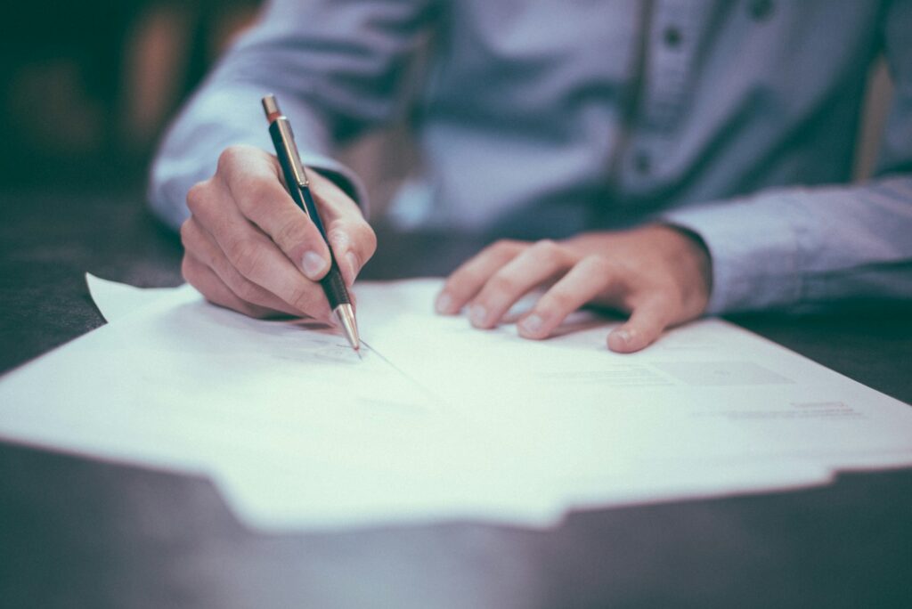 Advisor reviewing policy documents with a client
