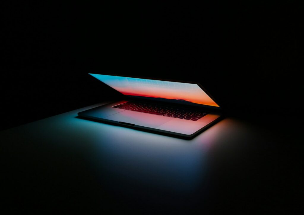 Developer workspace with laptop and code